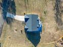 Aerial view of a house and surrounding yard at 3038 Bramblegate Dr, Mebane, NC 27302