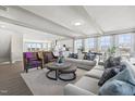 Bright living room with hardwood floors, comfortable seating, and an open floor plan at 600 Market Grove Dr # 200, Wake Forest, NC 27587