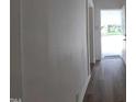 Bright hallway with light walls and wood-look flooring at 723 S Washington St, Rocky Mount, NC 27801