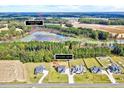 Aerial view of property location and surrounding area including trees and neighborhood at 798 Christian Light Rd, Fuquay Varina, NC 27526