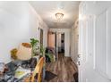 Entryway with wood-look flooring and access to other rooms at 1105 Carroll St, Durham, NC 27707