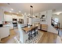 Modern kitchen with stainless steel appliances and an island at 1404 Hollyview Ave, Durham, NC 27703