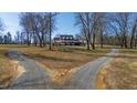 Long driveway leading to a beautiful home on a spacious lot at 5765 G Snow Camp Rd, Graham, NC 27253
