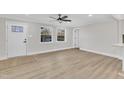 Bright living room featuring hardwood floors and neutral color palette at 919 Fiske St, Durham, NC 27703