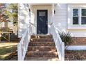 Brick steps lead to the front door of this charming house at 117 London Plain Ct, Cary, NC 27513