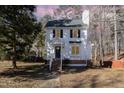Two story house with white siding and a dark door at 117 London Plain Ct, Cary, NC 27513