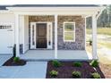 Material selections, including stone, siding, carpet, and tile options, allowing buyers to personalize their dream home at 128 High Hampton Way, Fuquay Varina, NC 27526