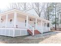 Charming home with a large covered porch, ideal for relaxing and entertaining at 1696 James Winston Rd, Oxford, NC 27565
