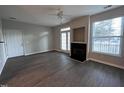 Living room with fireplace and hardwood floors at 3015 Winston Dr # Apt 102, Burlington, NC 27215