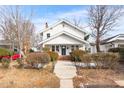Beautiful white house with a classic design and brick walkway at 507 Price Ave, Durham, NC 27701