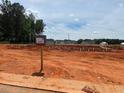 Construction site showing the foundation of future homes, ready for development at 62 Faircox Way # 139, Garner, NC 27529