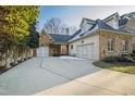 Two-car attached garage with additional parking at 1313 Enderbury Dr, Raleigh, NC 27614