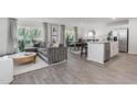 Open floor plan with living room, kitchen, and dining area at 2184 Monk Dr, Haw River, NC 27258