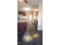 Kitchen with dark wood cabinets, stainless steel appliances, and an island at 320 Eastfield Dr, Rocky Mount, NC 27801