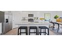 Modern kitchen with granite countertops and stainless steel appliances at 3600 Sorda Ct, Raleigh, NC 27610