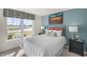 Cozy bedroom with a double bed and artwork at 3605 Sorda Ct, Raleigh, NC 27610