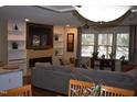 Living room features a built-in entertainment center and fireplace at 628 Stratford Dr, Zebulon, NC 27597