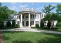Beautiful home with meticulously maintained landscaping and mature trees at 11201 Jonas Ridge Ln, Raleigh, NC 27613