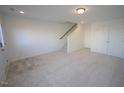 Bonus room with carpet, tile, and ample closet space at 1928 Robin Hill Ln, Raleigh, NC 27610
