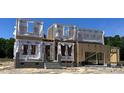 New construction home in progress showing the framing stage, revealing its future floor plan at 23 Frost Meadow Way, Lillington, NC 27546