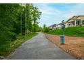 Enjoy an outdoor lifestyle with access to the community's well-maintained walking trail at 528 Ballast Pt, Clayton, NC 27520