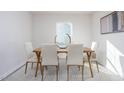 Dining room with wood table and six chairs, hardwood floors at 111 Reagan Crest Dr, Clayton, NC 27520