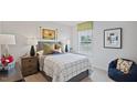Bedroom with a full bed, nightstands, and a beanbag chair at 115 Reagan Crest Dr, Clayton, NC 27520