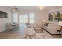 Bright dining area with seating for four and access to patio at 150 Rolesville Ridge Dr, Rolesville, NC 27571