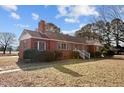 Ranch house with a walkway and well-maintained lawn at 809 Jeffreys Rd, Rocky Mount, NC 27804