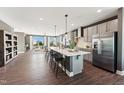 Spacious kitchen with large center island, modern appliances, and open floor plan at 107 Ailey Brook Way # 200, Wake Forest, NC 27587