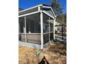 Screened porch with seating area, providing shade and relaxation at 1751 Flint Valley Ln, Apex, NC 27502