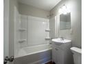 Updated bathroom with tub, shower, and vanity at 2223 Willie Pace Rd, Burlington, NC 27217