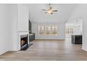 Spacious living room with a fireplace and hardwood floors at 250 Eason Creek Way, Clayton, NC 27527