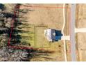 Aerial view of the home and yard, showing property lines and proximity to the road at 105 Langdon Chase Way, Selma, NC 27576