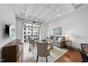 Inviting living room with comfortable seating, large windows, and open layout, creating a welcoming space at 1300 St Marys St # 403, Raleigh, NC 27605