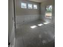 An elegant dining room with decorative trim and windows bringing in natural light at 14 E American Marigold Dr # 65, Benson, NC 27504