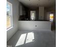 Bright kitchen area, awaiting finishing touches with lots of natural light at 14 E American Marigold Dr # 65, Benson, NC 27504
