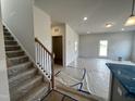 Inviting open-concept living area with bright lighting, perfect for entertaining and relaxing at 14 E American Marigold Dr # 65, Benson, NC 27504