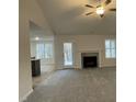 Spacious living room with fireplace, high ceilings and carpeting at 257 Magnolia Run Way, Benson, NC 27504