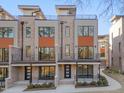 Contemporary townhome building with multiple units and private entrances at 1018 Manor Way, Durham, NC 27701