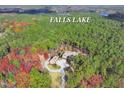 Estate home nestled in a wooded area near Falls Lake at 15508 Possum Track Rd, Raleigh, NC 27614