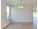 Simple dining room with hardwood floors and light walls at 86 Barn Door Dr, Lillington, NC 27546