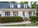 Two-story house with purple accents and a brick walkway at 1003 Pagoda Pl, Knightdale, NC 27545