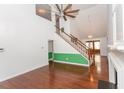 Spacious living room with hardwood floors, high ceilings, and a fireplace at 1003 Pagoda Pl, Knightdale, NC 27545