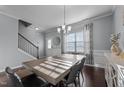 Bright dining room featuring a wood table and hardwood floors at 222 Sapphire Rd, Burlington, NC 27215