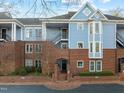 Three-story building, brick and blue exterior, multiple entrances at 243 New Bern Pl # 301, Raleigh, NC 27601