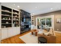 Spacious living room features a marble fireplace and built-in shelving at 255 Penley Cir, Raleigh, NC 27609