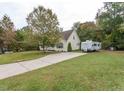 House exterior with a large front yard and driveway, RV parking at 270 W Silverado Ct, Kenly, NC 27542