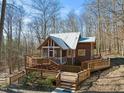 A lovely home with large deck and wooded views at 2901 Shagbark Ln, Graham, NC 27253