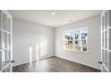 Spacious office with hardwood floors and large window at 553 Tim Currin Rd, Lillington, NC 27546